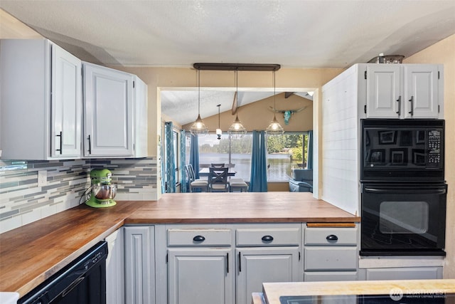 268 Kingsway W, Bremerton, WA 98312 - kitchen featuring black appliances, butcher block counters, vaulted ceiling, backsplash, and hanging light fixtures