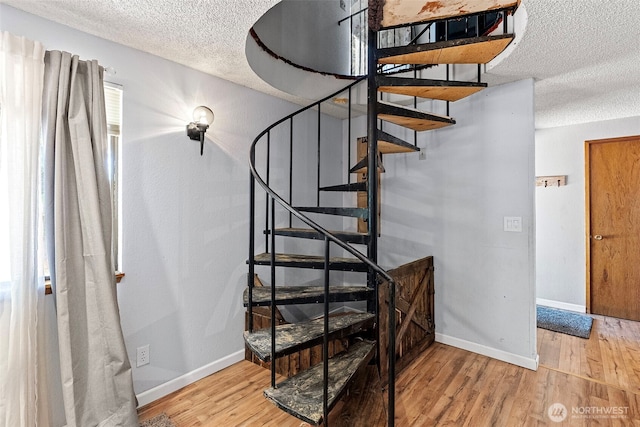 268 Kingsway W, Bremerton, WA 98312 - stairs with a textured ceiling and wood finished floors