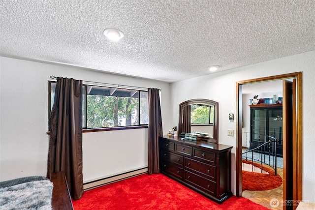 268 Kingsway W, Bremerton, WA 98312 - bedroom with a baseboard heating unit and a textured ceiling