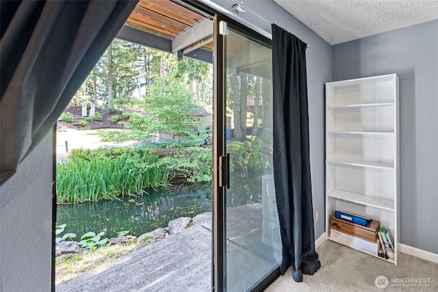 268 Kingsway W, Bremerton, WA 98312 - doorway to outside with carpet flooring and a textured ceiling