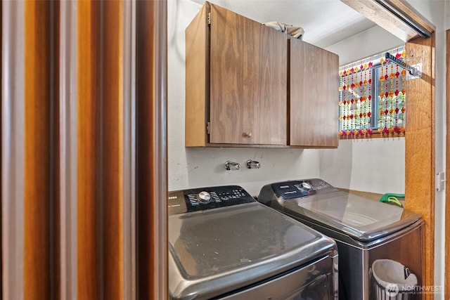 268 Kingsway W, Bremerton, WA 98312 - laundry area featuring cabinet space and washing machine and dryer