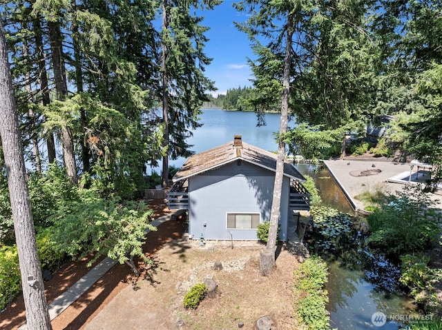 268 Kingsway W, Bremerton, WA 98312 - view of property exterior with stairs, a water view, and a chimney