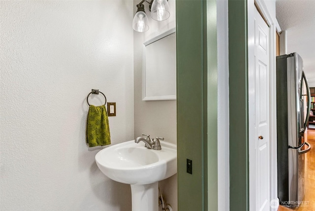34821 NE Gable Ave, La Center, WA 98629 - bathroom with wood finished floors and a sink
