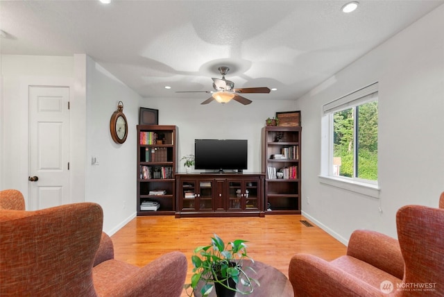 34821 NE Gable Ave, La Center, WA 98629 - living room featuring light wood-style flooring, ceiling fan, and recessed lighting