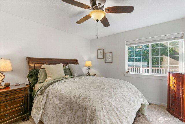 34821 NE Gable Ave, La Center, WA 98629 - carpeted bedroom featuring a ceiling fan and baseboards