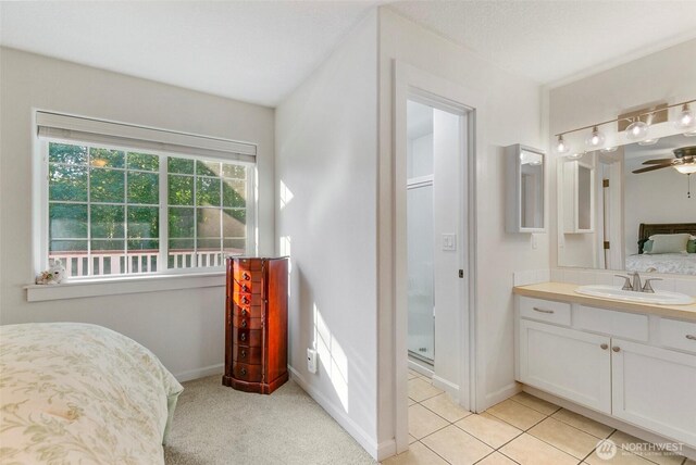 34821 NE Gable Ave, La Center, WA 98629 - bedroom featuring a sink and light tile patterned flooring