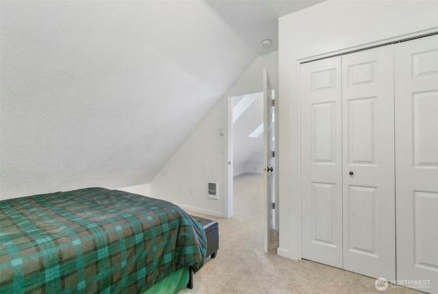34821 NE Gable Ave, La Center, WA 98629 - bedroom with lofted ceiling, carpet flooring, and a closet