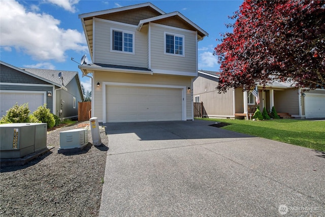 20610 6th Avenue Ct E, Spanaway, WA 98387 - traditional-style house with an attached garage and concrete driveway