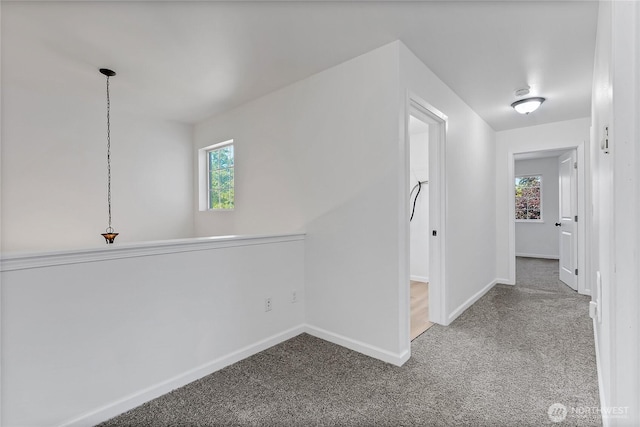 20610 6th Avenue Ct E, Spanaway, WA 98387 - hall featuring carpet flooring, baseboards, and healthy amount of natural light
