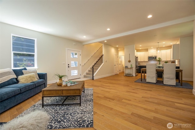 11 Kinglet Ct, Bellingham, WA 98229 - living room with recessed lighting, stairs, light wood-type flooring, and baseboards