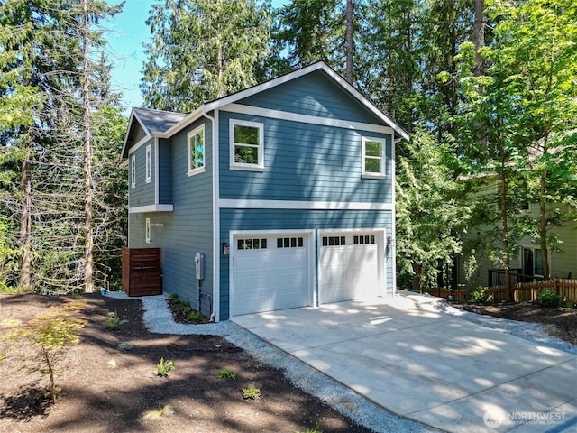 11 Kinglet Ct, Bellingham, WA 98229 - view of home's exterior featuring an attached garage and concrete driveway