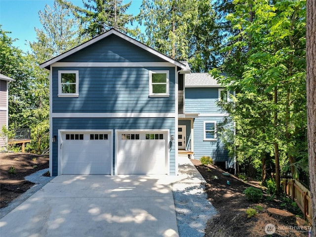 11 Kinglet Ct, Bellingham, WA 98229 - view of front facade with concrete driveway and a garage