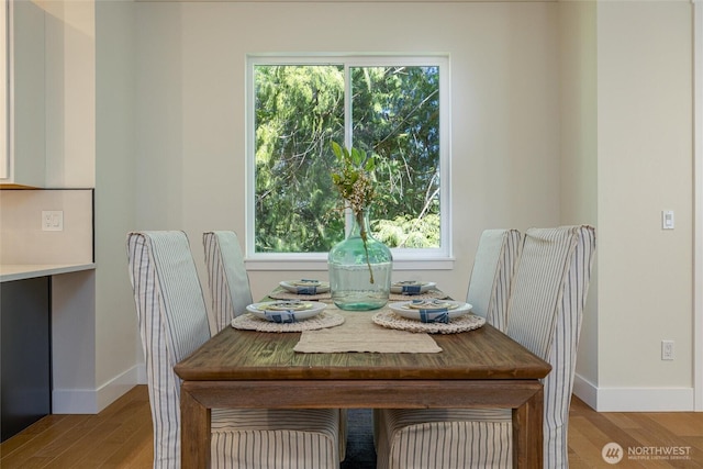 11 Kinglet Ct, Bellingham, WA 98229 - dining space with baseboards, wood finished floors, and healthy amount of natural light