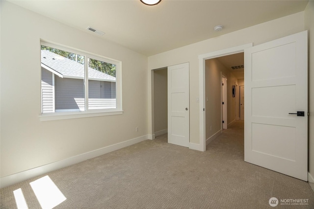 11 Kinglet Ct, Bellingham, WA 98229 - unfurnished bedroom featuring light carpet and baseboards