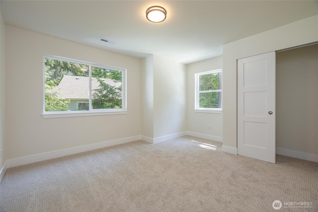11 Kinglet Ct, Bellingham, WA 98229 - unfurnished bedroom featuring carpet floors, baseboards, and a closet