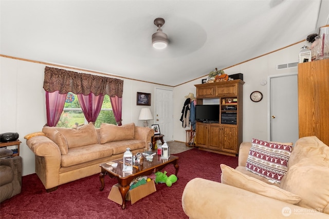 1201 8th St, Vader, WA 98593 - living area with dark colored carpet, vaulted ceiling, a ceiling fan, and crown molding