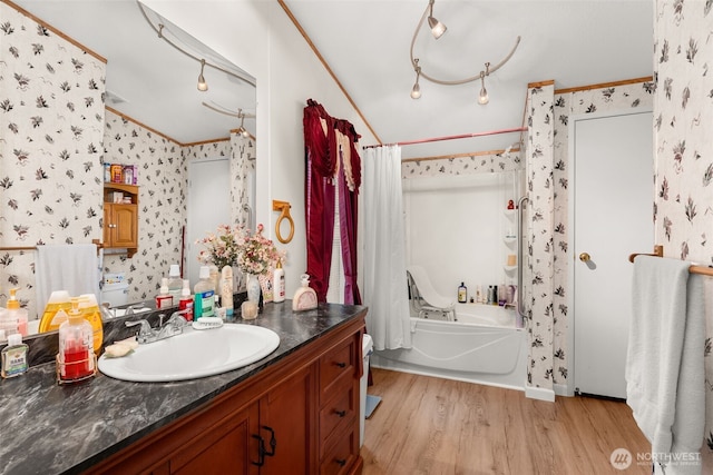 1201 8th St, Vader, WA 98593 - full bath featuring wallpapered walls, ornamental molding, wood finished floors, vanity, and shower / tub combo