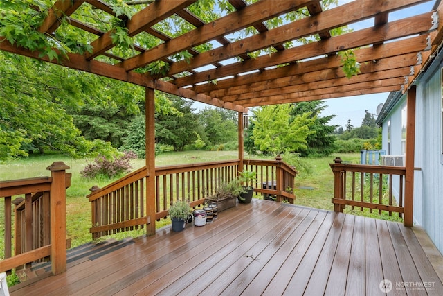 1201 8th St, Vader, WA 98593 - wooden deck featuring a lawn and a pergola
