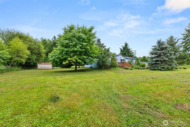 1201 8th St, Vader, WA 98593 - view of grassy yard with a wooden deck