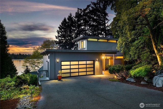 2019 Killarney Way, Bellevue, WA 98004 - modern home with driveway, stucco siding, and a garage