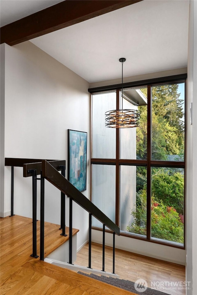 2019 Killarney Way, Bellevue, WA 98004 - staircase with a chandelier, wood finished floors, and beam ceiling