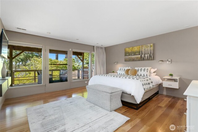 2019 Killarney Way, Bellevue, WA 98004 - bedroom featuring access to outside and light wood-style flooring