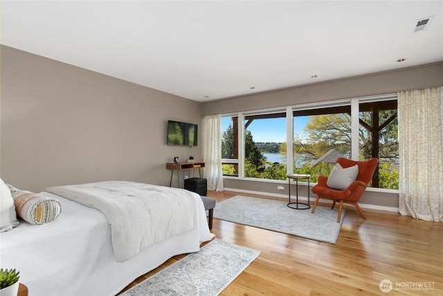 2019 Killarney Way, Bellevue, WA 98004 - bedroom with light wood-style flooring and baseboards