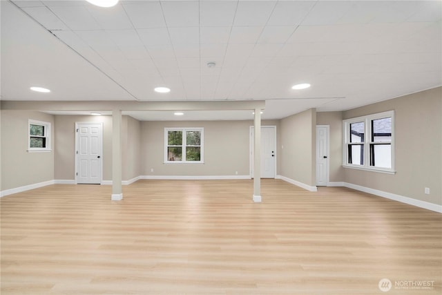 11101 Bingham Ave E, Tacoma, WA 98446 - below grade area with light wood-style floors, baseboards, plenty of natural light, and recessed lighting
