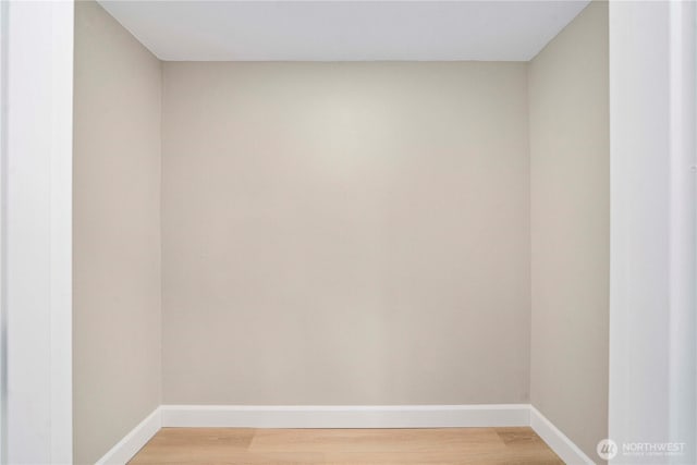 11101 Bingham Ave E, Tacoma, WA 98446 - unfurnished room featuring baseboards and light wood finished floors