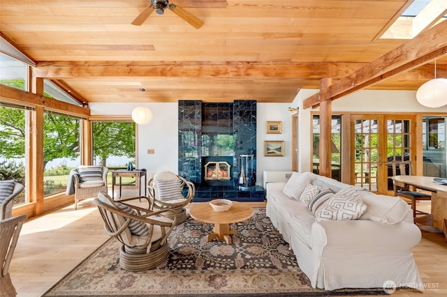 317 Eagles Roost Ln, Lopez Island, WA 98261 - living area with wood ceiling, light wood finished floors, french doors, and ceiling fan