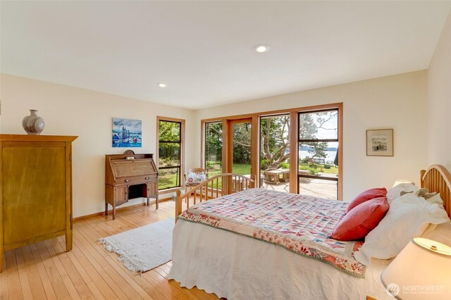 317 Eagles Roost Ln, Lopez Island, WA 98261 - bedroom with light wood-type flooring, recessed lighting, access to exterior, and baseboards