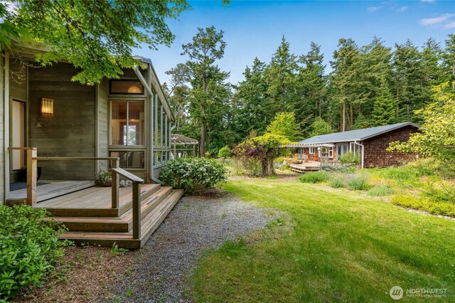 317 Eagles Roost Ln, Lopez Island, WA 98261 - view of grassy yard featuring a wooden deck