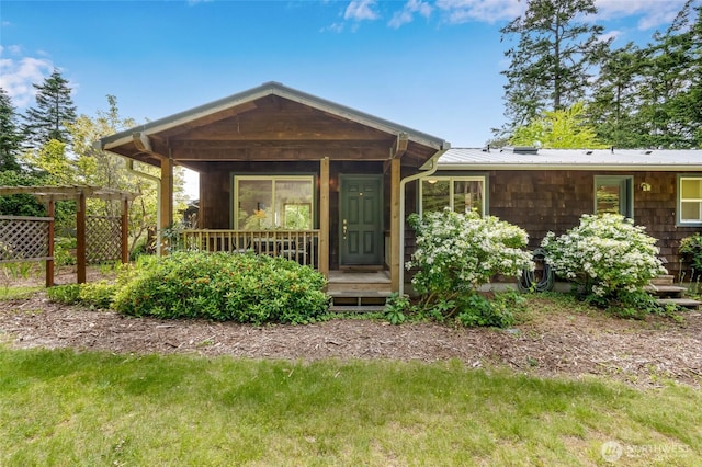 317 Eagles Roost Ln, Lopez Island, WA 98261 - view of front of home with covered porch and metal roof