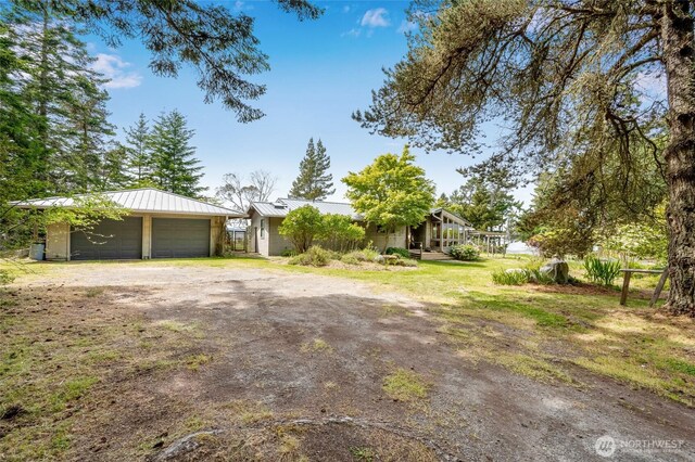 317 Eagles Roost Ln, Lopez Island, WA 98261 - view of yard with a detached garage