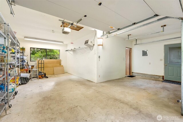 317 Eagles Roost Ln, Lopez Island, WA 98261 - garage with a garage door opener and electric panel