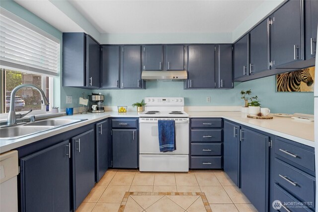20110 60th Ave W Unit F26, Lynnwood, WA 98036 - kitchen with white appliances, under cabinet range hood, a sink, light tile patterned floors, and light countertops