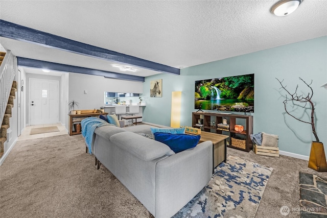 20110 60th Ave W Unit F26, Lynnwood, WA 98036 - living room with stairs, carpet, a textured ceiling, and baseboards