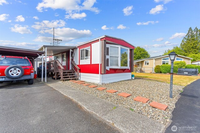 260 Ho Hum Ln, Aberdeen, WA 98520 - manufactured / mobile home with a carport