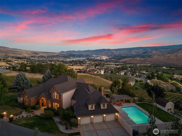 4180 April Dr, Wenatchee, WA 98801 - aerial view of property and surrounding area with mountains and a pool