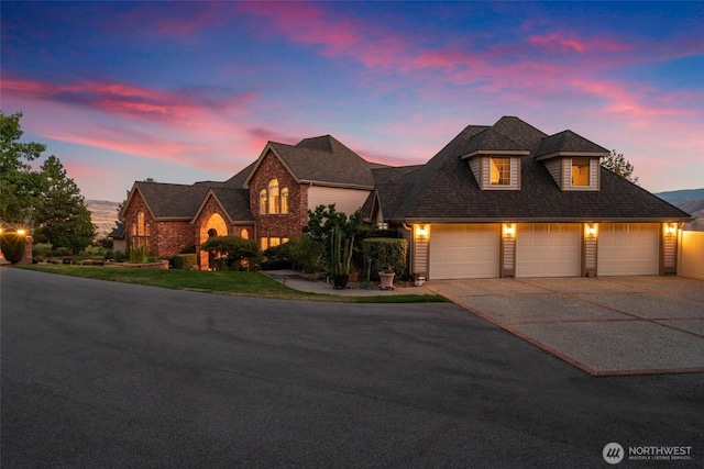 4180 April Dr, Wenatchee, WA 98801 - traditional home with concrete driveway and a garage