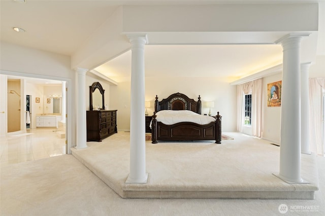 4180 April Dr, Wenatchee, WA 98801 - carpeted bedroom featuring ensuite bath and ornate columns