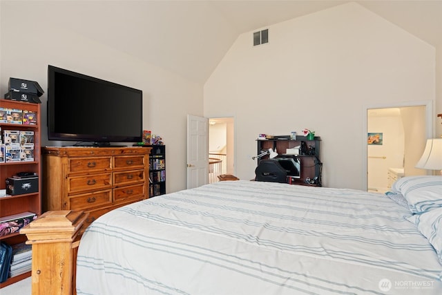 4180 April Dr, Wenatchee, WA 98801 - bedroom with high vaulted ceiling and ensuite bathroom