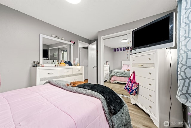 1209 Dundee Dr, Cosmopolis, WA 98537 - bedroom featuring light wood finished floors and ensuite bath