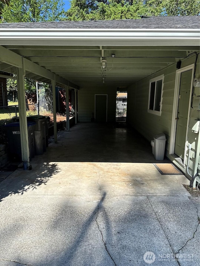 4882 Laura Ln SE, Port Orchard, WA 98367 - view of parking with concrete driveway and an attached carport