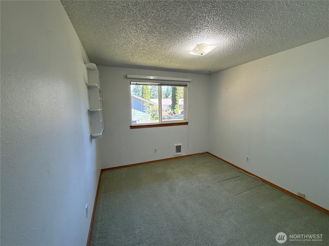 4882 Laura Ln SE, Port Orchard, WA 98367 - carpeted empty room with a textured ceiling and baseboards