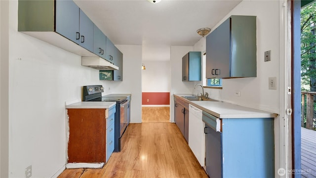 29604 22nd S, Federal Way, WA 98003 - kitchen with black / electric stove, light wood-style floors, a sink, light countertops, and under cabinet range hood