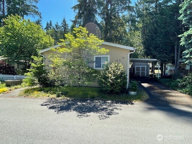 11410 127th St E Unit 185, Puyallup, WA 98374 - view of home's exterior featuring driveway