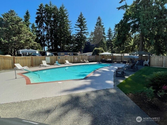 11410 127th St E Unit 185, Puyallup, WA 98374 - view of pool featuring a patio area