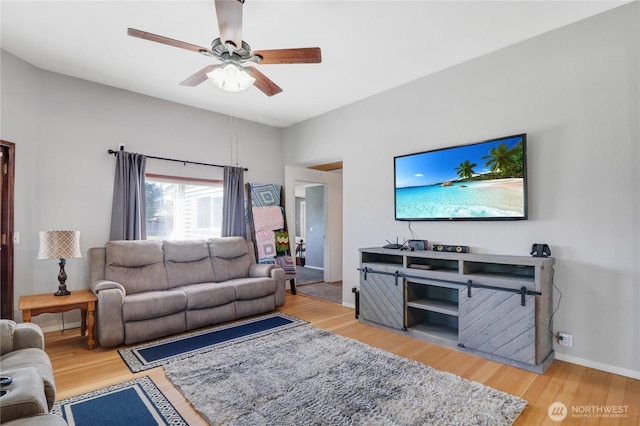 108 2nd St SE, Rainier, WA 98576 - living area with a ceiling fan and wood finished floors