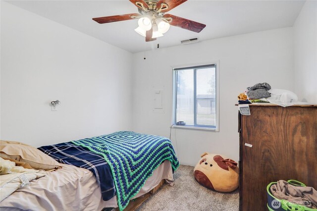 108 2nd St SE, Rainier, WA 98576 - bedroom featuring carpet flooring and ceiling fan